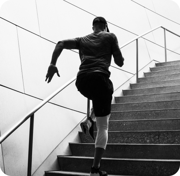Adidas athlete running up the stairs in Los Angeles