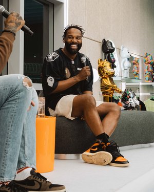 Ex-NBA player, Baron Davis being interviewed during Miami Art Basel for a live podcast.