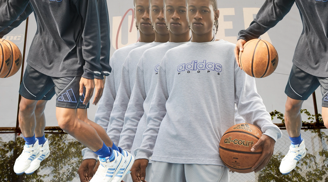 Black model posing for Adidas with a basketball in hand